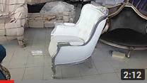 single sofa with white faux leather upholstery